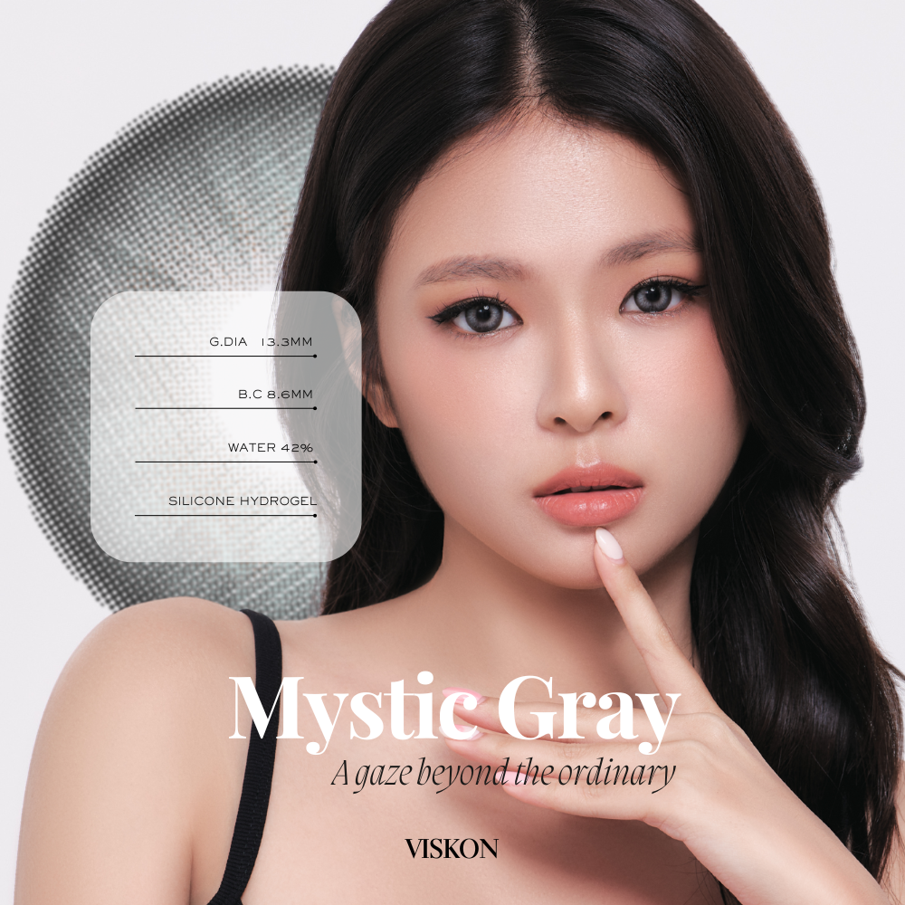 Model showcasing VISKON Mystic Gray contact lenses with soft gray tone and natural iris detailing
