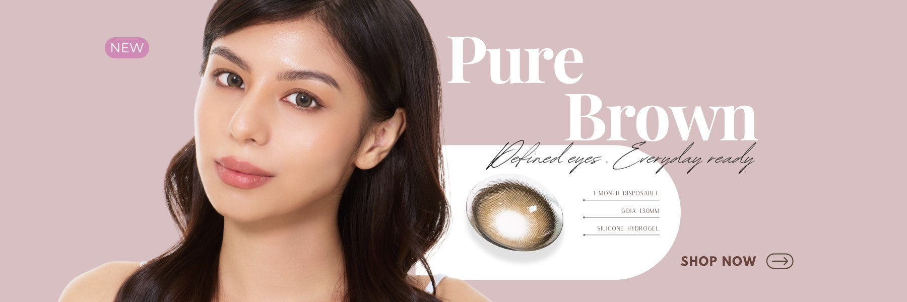 Banner of Pure Brown contact lenses on a model and lens on a muted pink background.