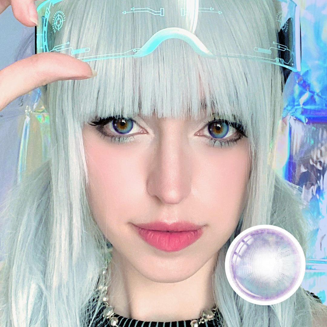 Model wearing Metafantasia Blue contact lenses with futuristic accessories and styling, showcasing blue color for a fantasy-inspired look.