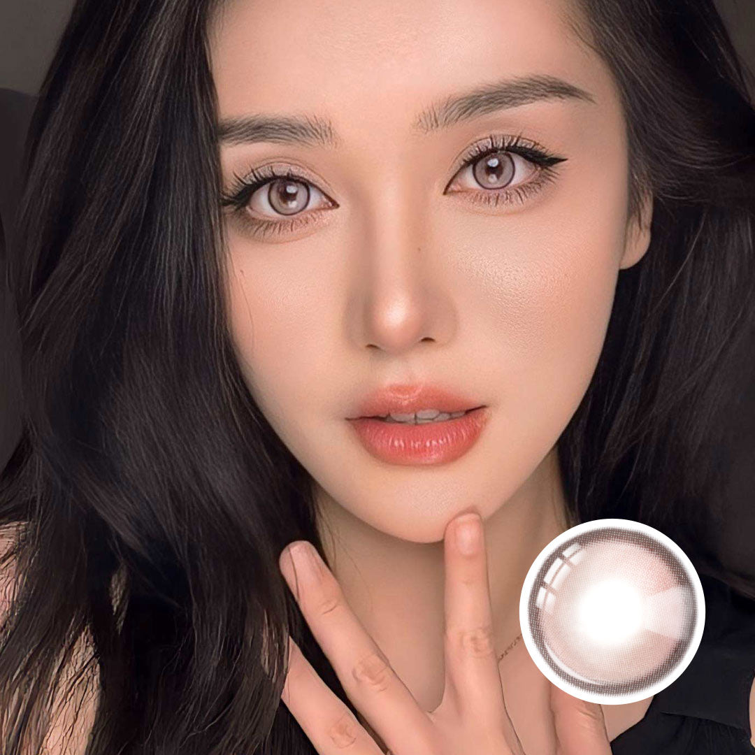 Model wearing Caramel Pink Chic contact lenses with soft pink tones, enhancing eyes for a chic and natural look.