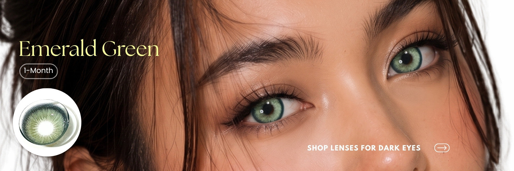 Close-up of a woman's face wearing green contact lenses, with text reading 'Emerald Green' and a small circular inset showing the lens color. 