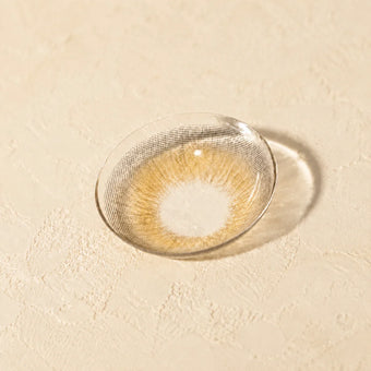 Hazel colored contact lens